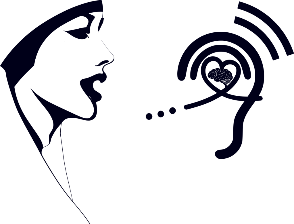 Ilustração de uma pessoa de perfil ao lado de uma orelha. Nela, há um cérebro dentro de um coração.